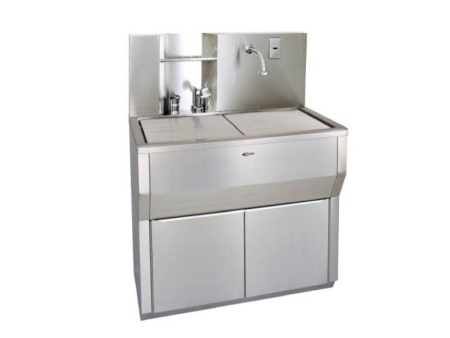 東京メニックス製の手術用手洗いシンクHW-100。コンパクト設計で省スペースに設置可能。手洗いと器具の洗浄ができる多機能シンク。豊富なオプションとフルオープン収納を備え、動物病院での使用に最適。