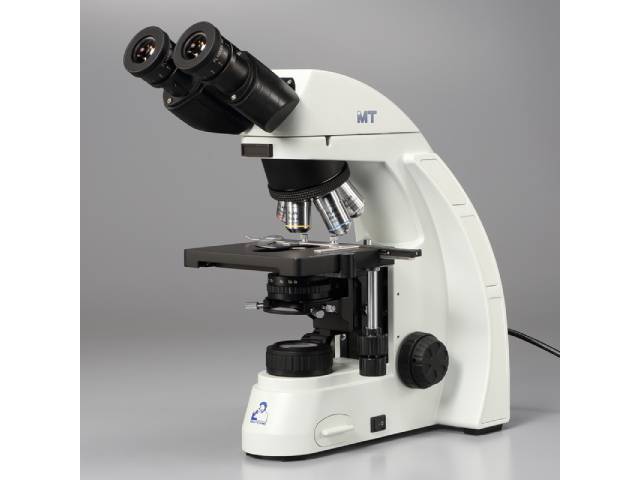 メイジテクノの双眼生物顕微鏡MT-50。無限遠補正光学系とプラン・アクロマート対物レンズ（4x, 10x, 40x, 100x）を搭載し、3W LED照明で鮮明な観察像を提供。安定性が高く持ち運びも容易な鋳造アルミニウム製ベース。