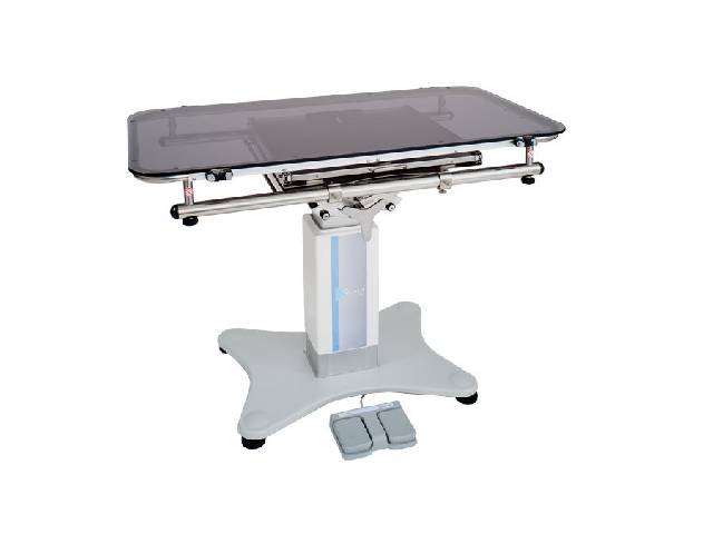 東京メニックス 撮影台タイプ天板 OX-1100T-TM。電動昇降と20度チルト機能を備えたアクリル製獣医療用手術台天板。
